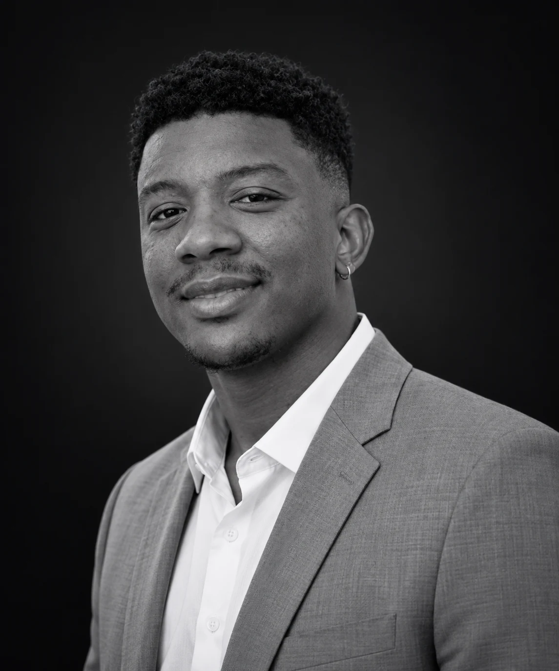 Eddie Perry in a gray suit jacket